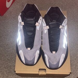 Yeezy Black and Gray Sneakers with Reflective Accents